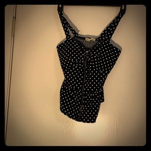 Black and white polkadot stretchy greaser shirt.